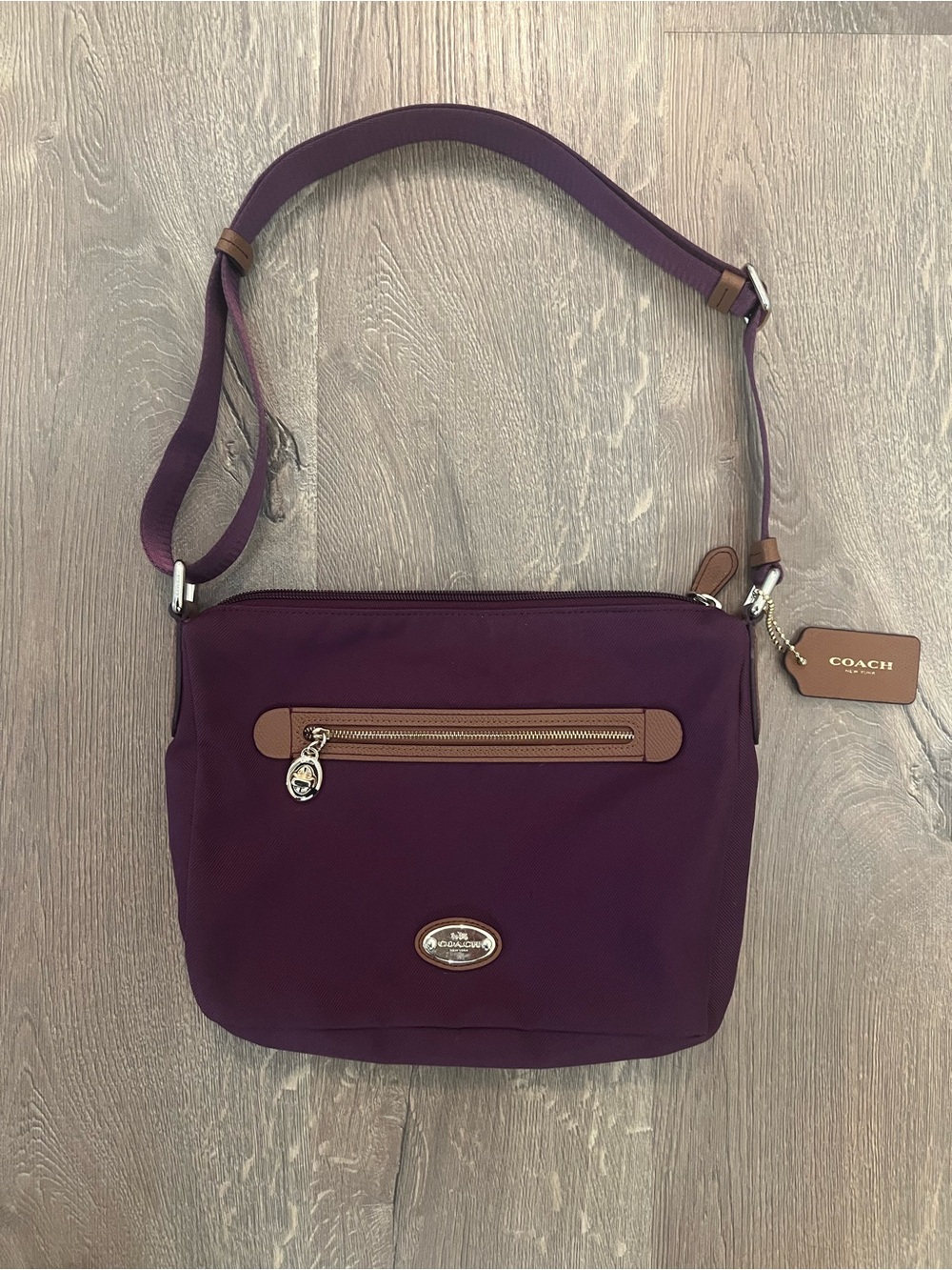 Coach Plum Crossbody Bag with Tan Trim